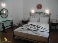 the bedroom of one of the two appartments from the PVergos House accommodation in Parga 
